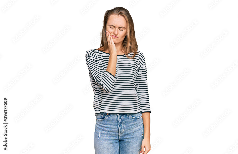Beautiful blonde woman wearing casual clothes touching mouth with hand with painful expression because of toothache or dental illness on teeth. dentist Beautiful blonde woman wearing casual clothes touching mouth with hand with painful expression because of toothache or dental illness on teeth. dentist