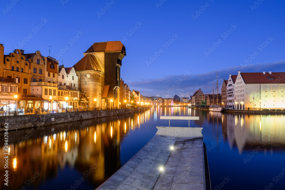 Motlawa River and beautiful historic architecture of Gdansk at night. Poland