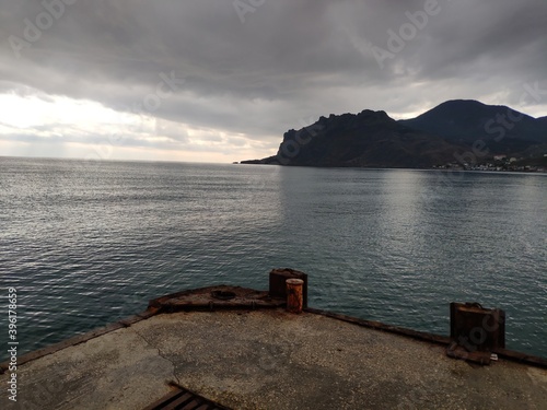 Crimean peninsula, southern coast, Koktebel village. The oldest dormant volcano in Europe is Mount Karadag. photo