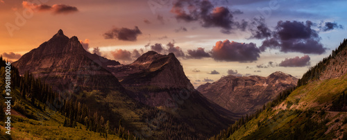 Beautiful Panoramic View of American Rockies from a viewpoint. Dramatic Sunset Sky Art Render. Taken in Glacier National Park, Montana, United States of America.