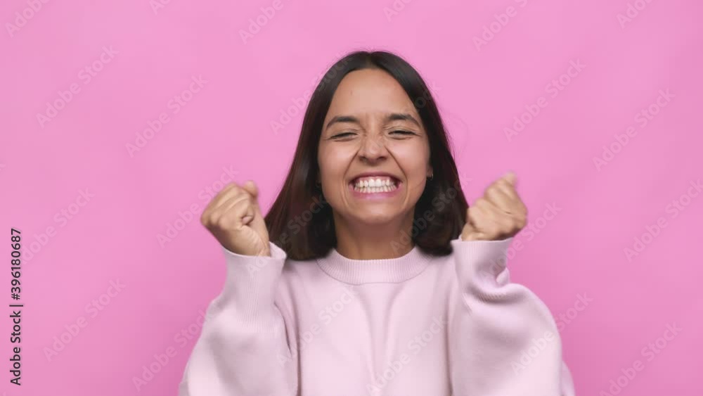 Young cute mixed race woman expressing emotions closeup face