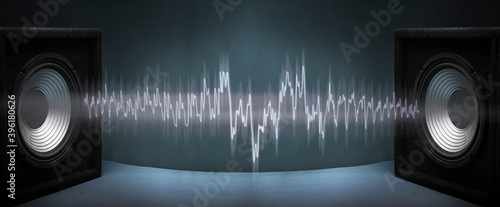 Bild auf Leinwand Black subwoofer speaker car audio music system on orange background