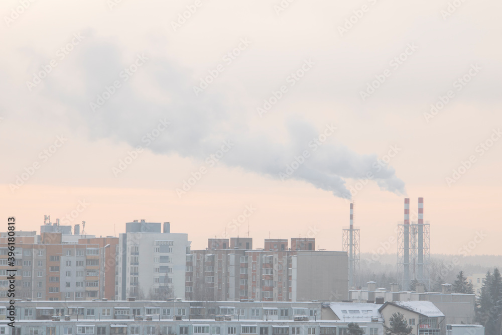 Smoking a pipe of heating plants supplying heat to the city