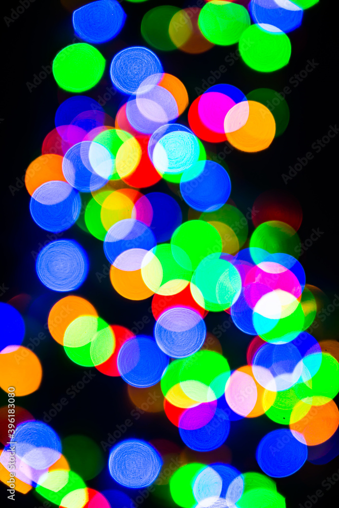 Bokeh of blurred Christmas lights - all colours - green, blue, orange, white, red