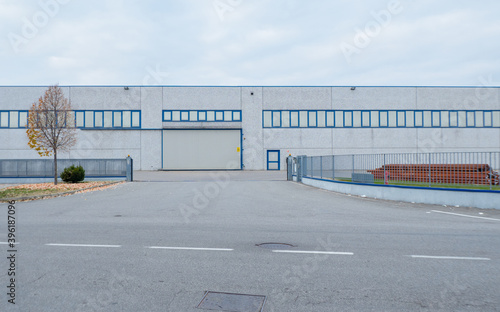 Wallpaper Mural industrial area in the suburbs, external view of unused concrete warehouses Torontodigital.ca