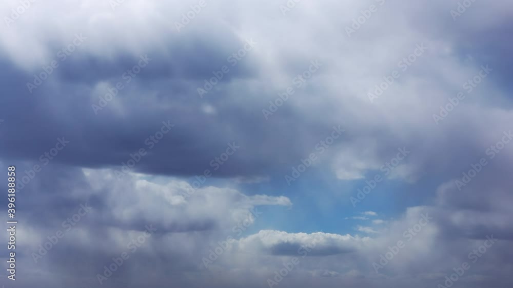 Beautiful Cloudy Dramatic Sky With Fluffy Clouds. Natural Background Beautiful Cloudy Dramatic Sky With Fluffy Clouds. Natural Background