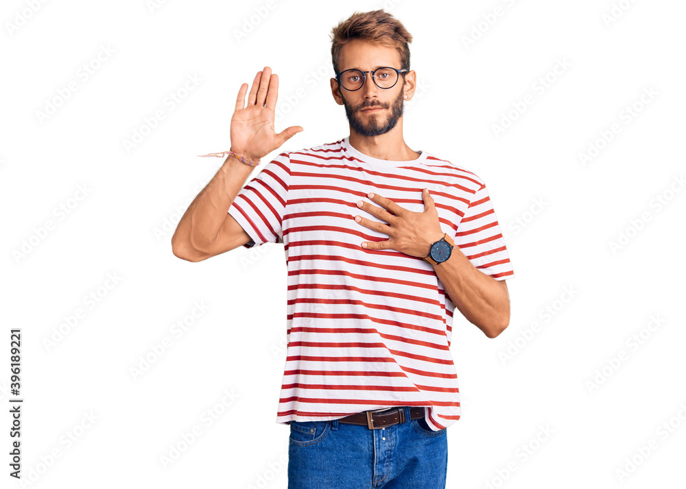 Fototapeta premium Handsome blond man with beard wearing casual clothes and glasses swearing with hand on chest and open palm, making a loyalty promise oath