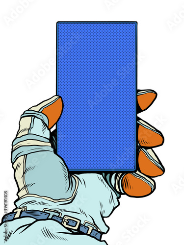 Cosmonaut with a smartphone. Space satellite Internet