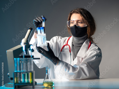 Blood test. A lab assistant...