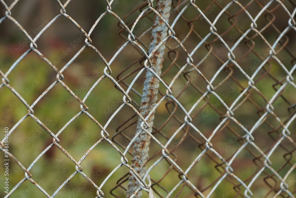 gray metal texture from old mesh with iron reinforcement on the street gray metal texture from old mesh with iron reinforcement on the street