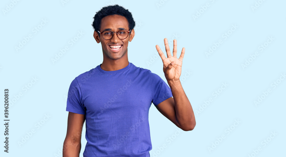 African handsome man wearing casual clothes and glasses showing and pointing up with fingers number four while smiling confident and happy. African handsome man wearing casual clothes and glasses showing and pointing up with fingers number four while smiling confident and happy.