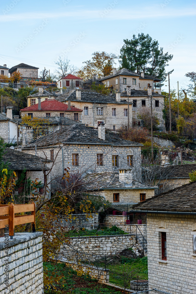 Traditional stone building     during  fall season in the picturesque village of Aristi in Zagori Greece.