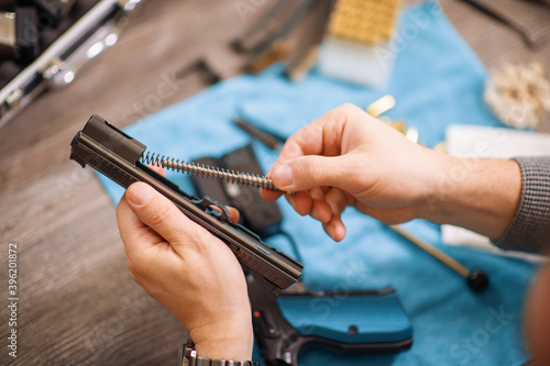 Close up of cleaning a gun