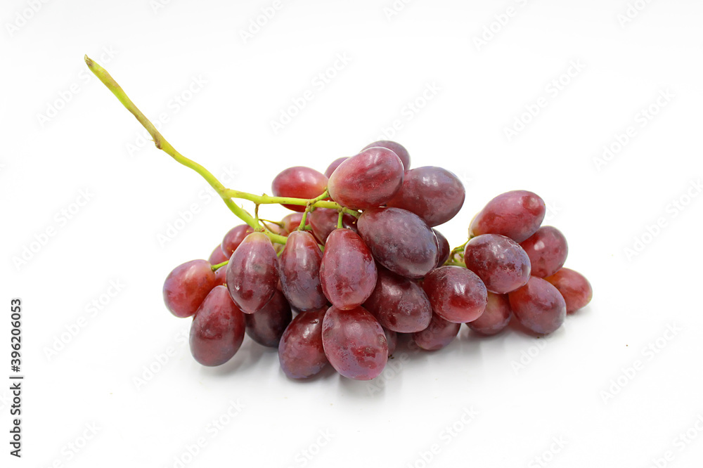 bunch of pink red grapes isolated on white