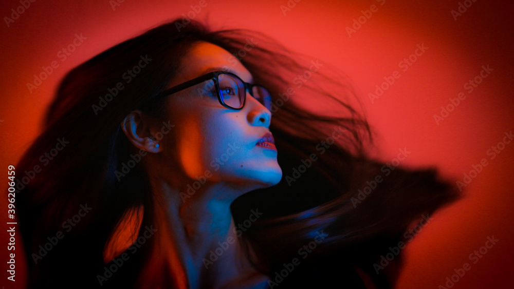 Young and pretty Asian - portrait shot in RGB colors - home shooting