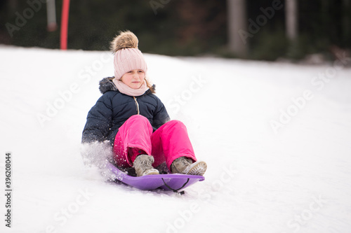 child playing in snow