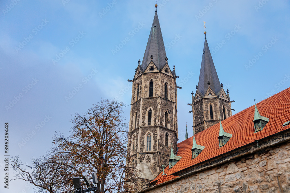 Medieval stone St. Bartholomew´s Church in autumn day, arched windows, chimeras and gargoyles, Gothic Cathedral with belfry in Kolin, Central Bohemia, Czech republic