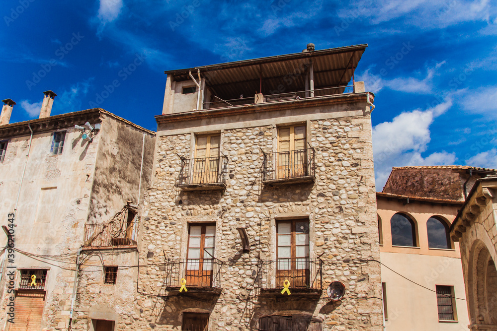 Besalu old city buildings blue sky