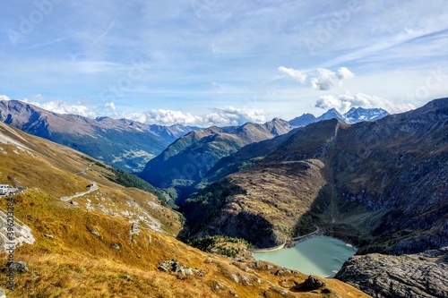 Beautiful alpine mountains. Fresh clean air. Selective focus. Picturesque places to relax and climb the mountains. Mountain lake surrounded by mountains, cold clear water.