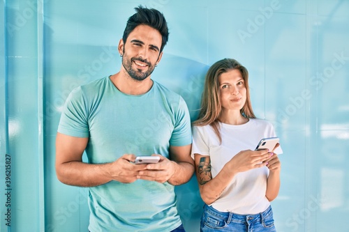 Young couple of boyfriend and girlfriend together using smartphone