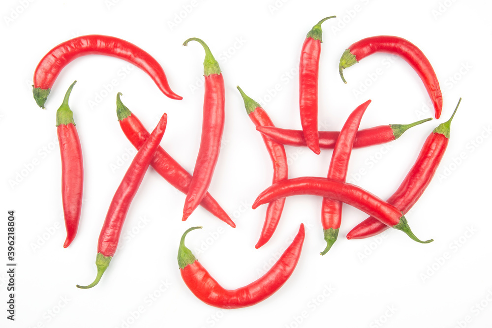 Red hot chili peppers on a white background. food figures. Vitamin vegetable food Red hot chili peppers on a white background. food figures. Vitamin vegetable food