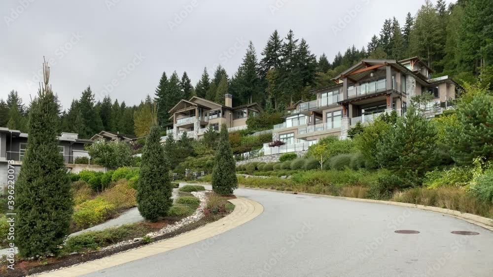 A perfect neighbourhood. Houses in suburb at Summer in the north America. Luxury houses with nice landscape. A perfect neighbourhood. Houses in suburb at Summer in the north America. Luxury houses with nice landscape.
