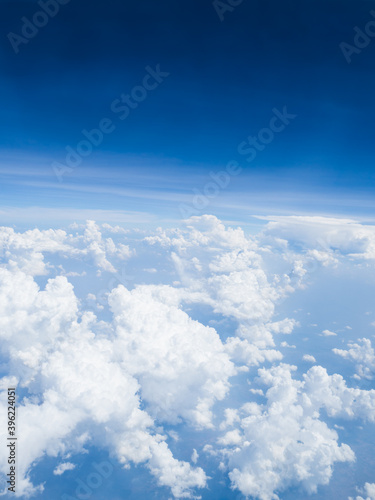 View of blue sky background with white cloud on high level