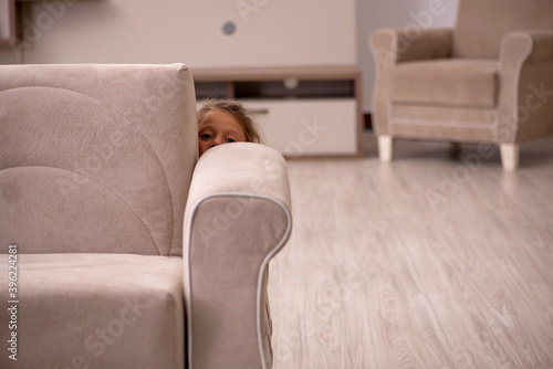 Canvas Print Small girl staying alone at home