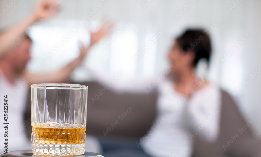 Angry woman yelling at her lazy husband
Angry woman yelling at her lazy husband
