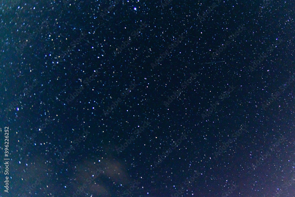 Obraz premium Background of the night sky with many stars