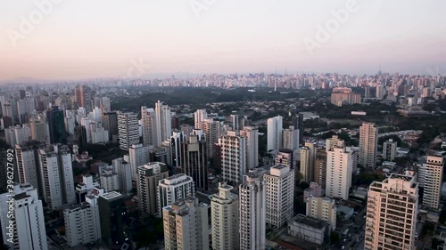Wallpaper Mural Aerial view of skyscraper buildings, during a colorful sunset, in the Indianopolis area of Sao Paulo city, Brazil, South America - tracking, drone shot Torontodigital.ca