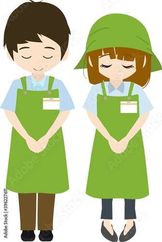 挨拶・礼・お辞儀をするシンプルな男女の店員のイラスト