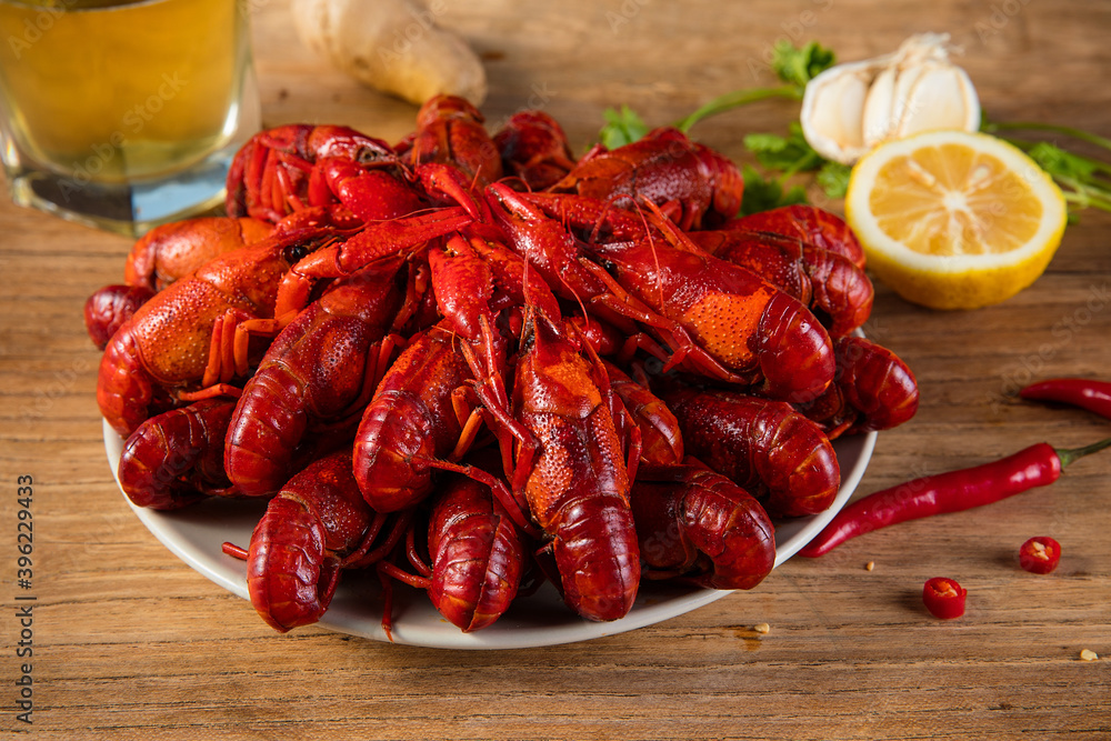 closeup gourmet lobster on white wooden table closeup gourmet lobster on white wooden table