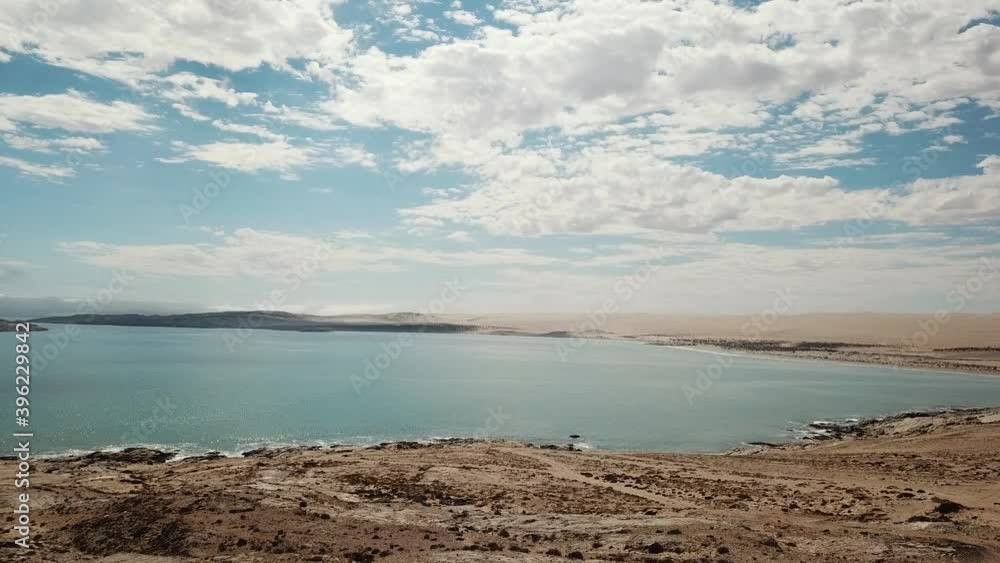 The Namib Desert Dunes and the Atlantic Ocean Meets, Skeleton Coast, Southern Africa Namibia, Luderitz Town Shark Island Aerial Shot The Namib Desert Dunes and the Atlantic Ocean Meets, Skeleton Coast, Southern Africa Namibia, Luderitz Town Shark Island Aerial Shot
