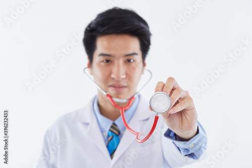 young man doctor posing with a stethoscope