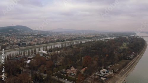 Aerial View Of Margaret Island (Margit-Sziget) In The Middle Of Danube River In Budapest, Hungary During Autumn - panning drone photo