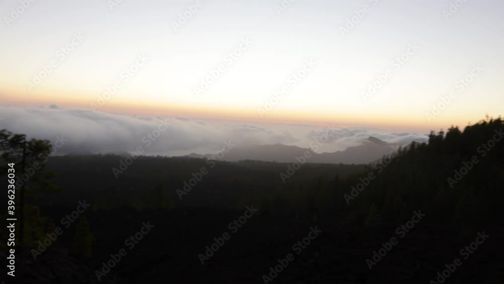 Aerial capture of the spectacular sunset above the clouds in the Teide volcano national park in Tenerife Aerial capture of the spectacular sunset above the clouds in the Teide volcano national park in Tenerife