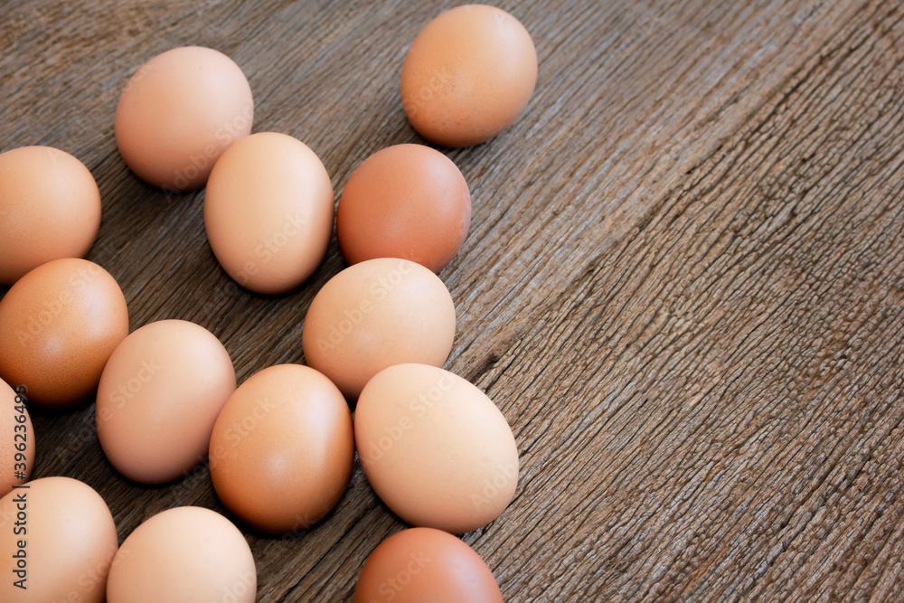 Close-up chicken eggs on wooden background. Close-up chicken eggs on wooden background.