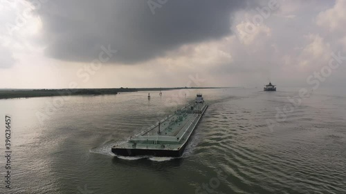 Barge and Pushboat near Morgan's Point in LaPorte, Texas photo