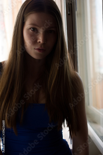 Free Download portrait of a woman with brown hair in blue shirt - GFXLoad