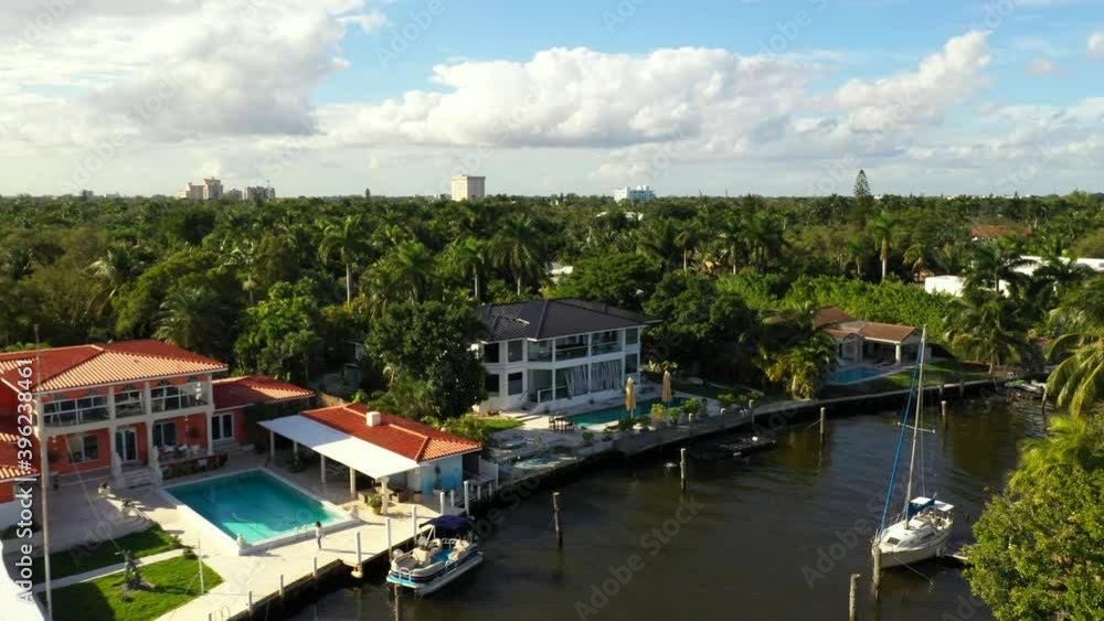 Aerial tour Miami real estate waterfront on canal Aerial tour Miami real estate waterfront on canal