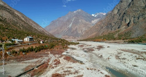 Autumn aerial view of a dry and sandy rocky mountain valley from Asia. Himachal, Lahaul Spiti, India photo