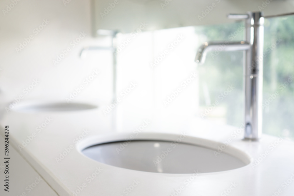Fototapeta premium Blurred Sink for hand washing in bathroom