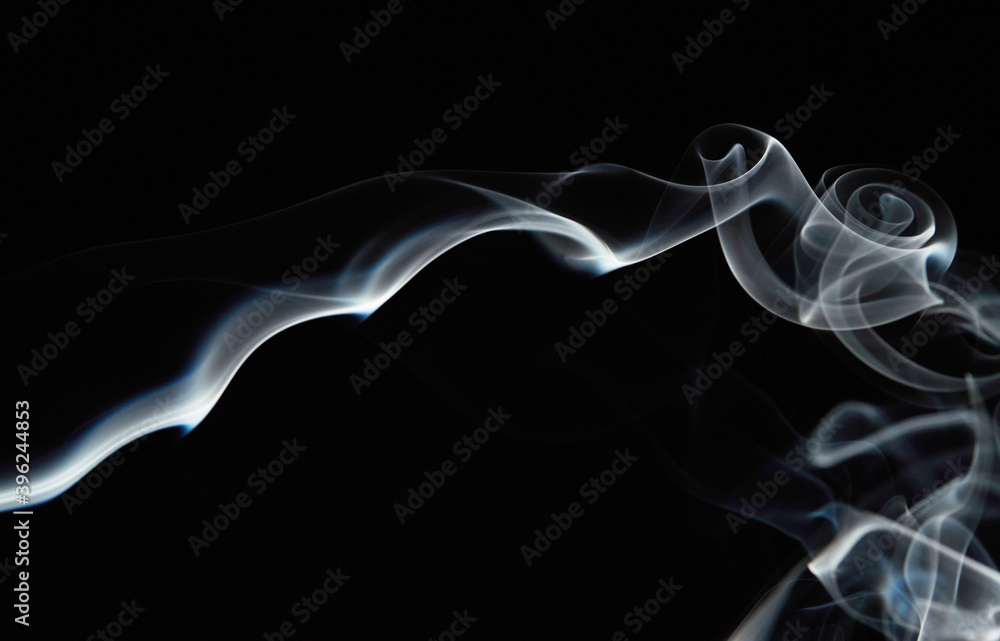 White natural steam smoke effect on solid black background with