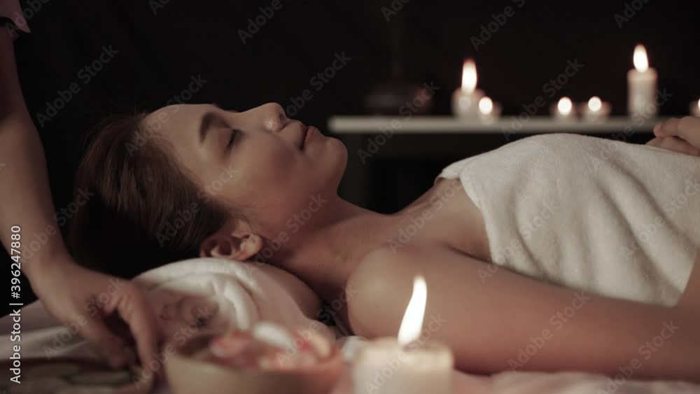 The masseuse at the spa uses cucumber slices to nourish the face and eyes of the Asian massage therapist inside the spa.
The masseuse at the spa uses cucumber slices to nourish the face and eyes of the Asian massage therapist inside the spa.