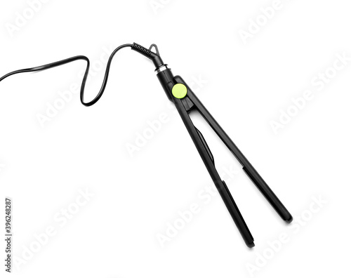 Straightening iron on white background