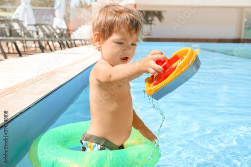 Cute baby boy with inflatab...