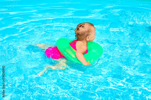 Cute baby girl with inflata...