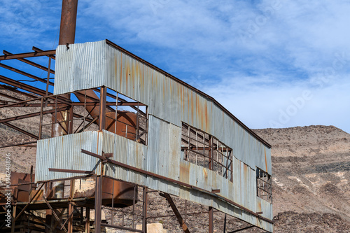 Sheet metal facade at an abandoned lead mine near Bonnie Claire, Nevada, USA © davidrh
