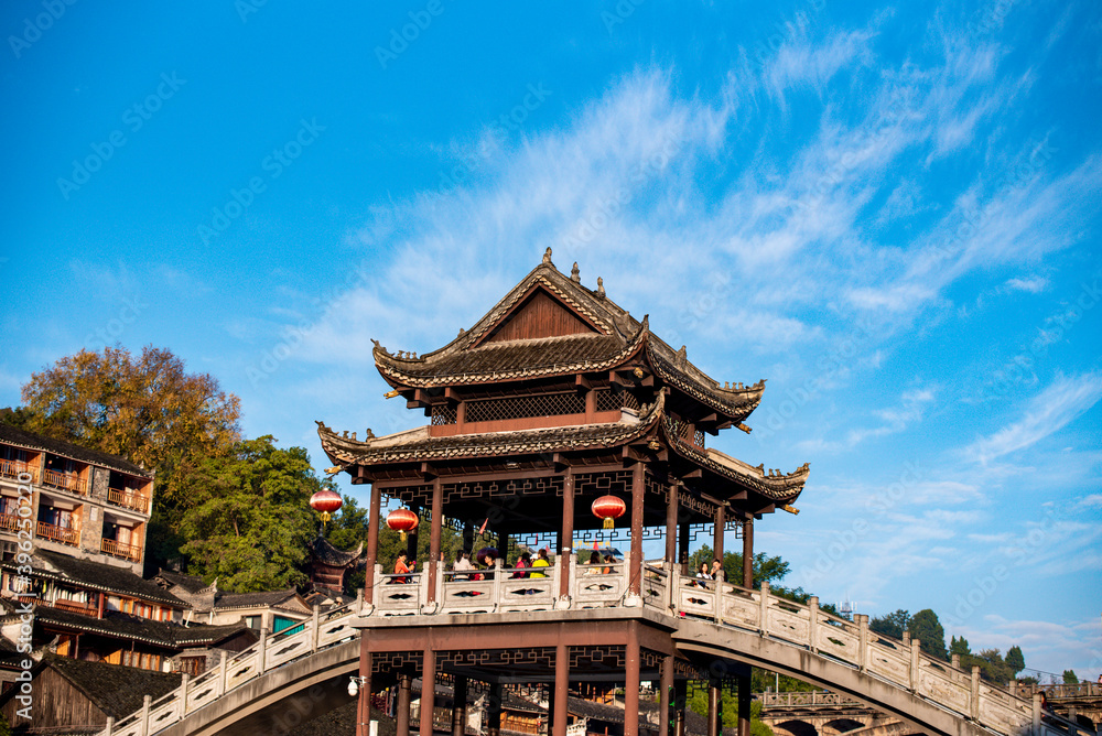 Scenery of old houses in Fenghuang City, Hunan Province, China. The ancient city of Fenghuang is regarded by UNESCO as a World Heritage Site. Scenery of old houses in Fenghuang City, Hunan Province, China. The ancient city of Fenghuang is regarded by UNESCO as a World Heritage Site.
